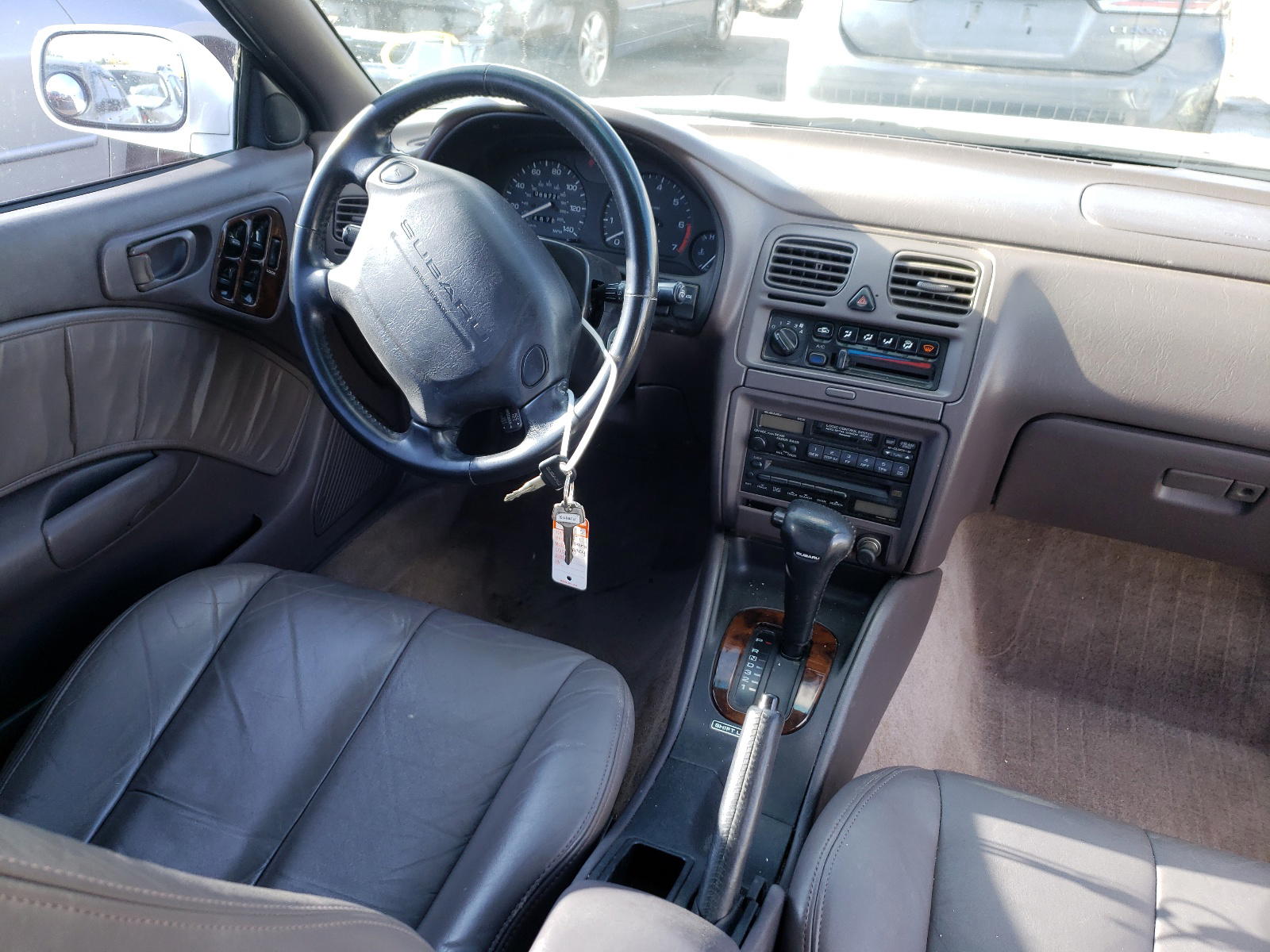 Photo 9 from auction – 1995 SUBARU LEGACY LS with VIN 4S3BD6550S7229129