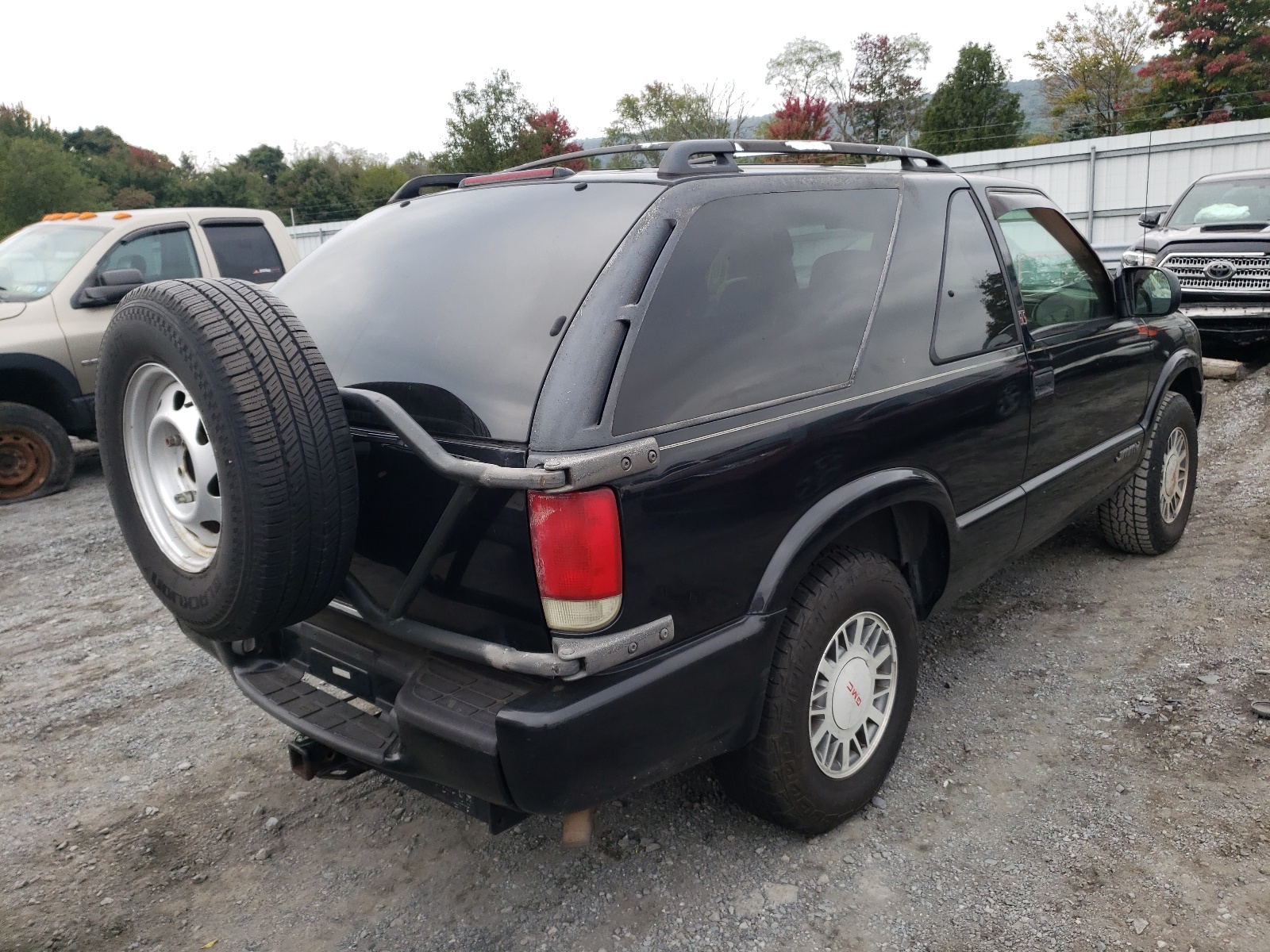Photo 4 from auction – 2001 GMC JIMMY with VIN 1GKCT18W41K179043