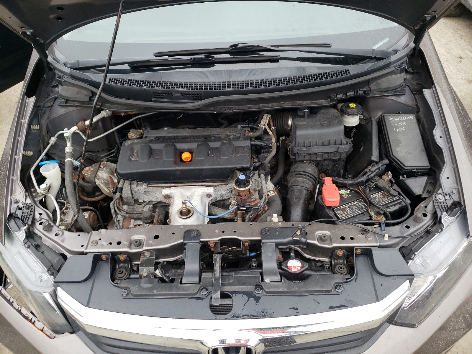 Photo 7 from auction – 2012 HONDA CIVIC LX with VIN 2HGFB2F51CH500110