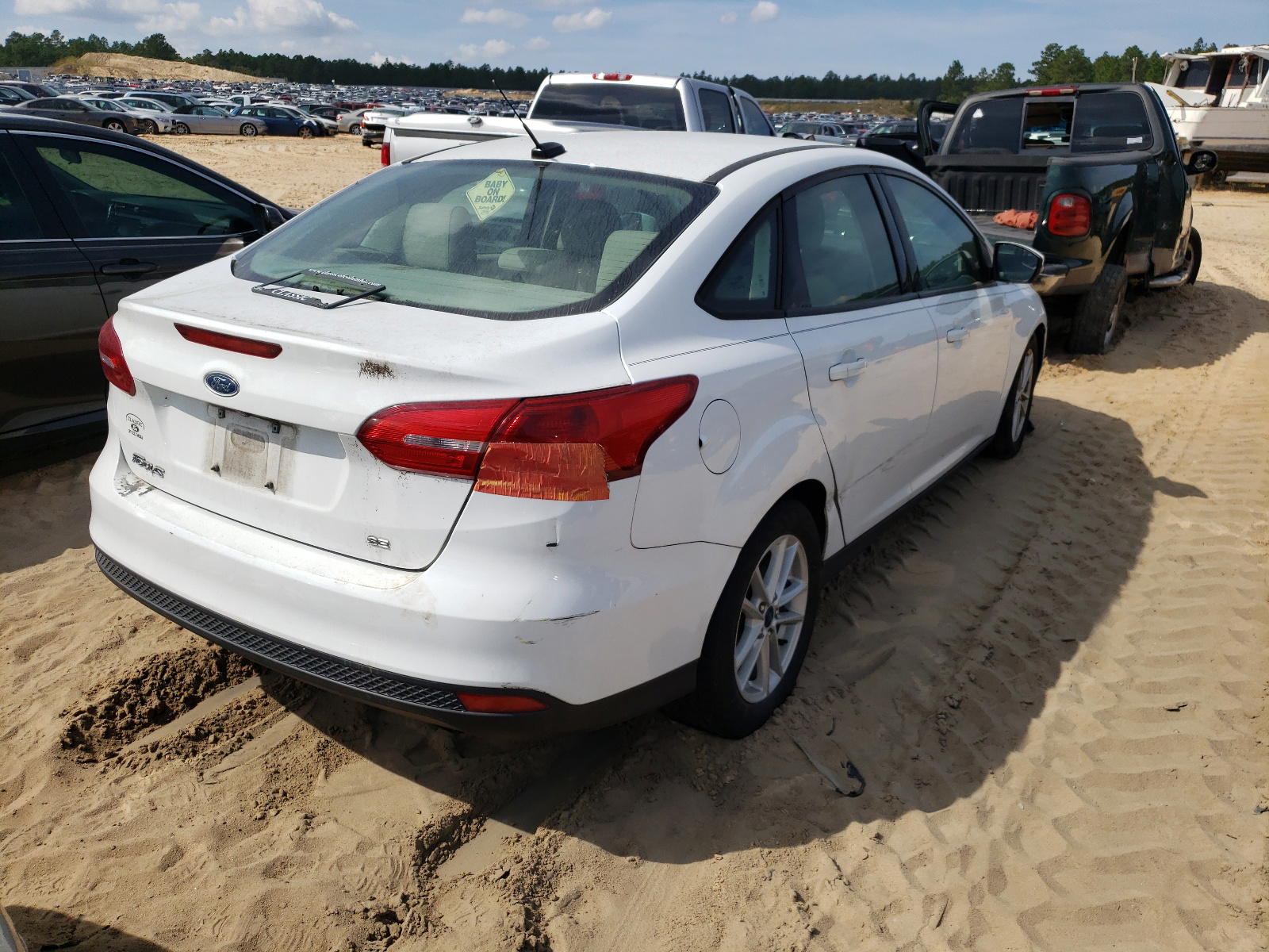Photo 4 from auction – 2017 FORD FOCUS SE with VIN 1FADP3F21HL269437