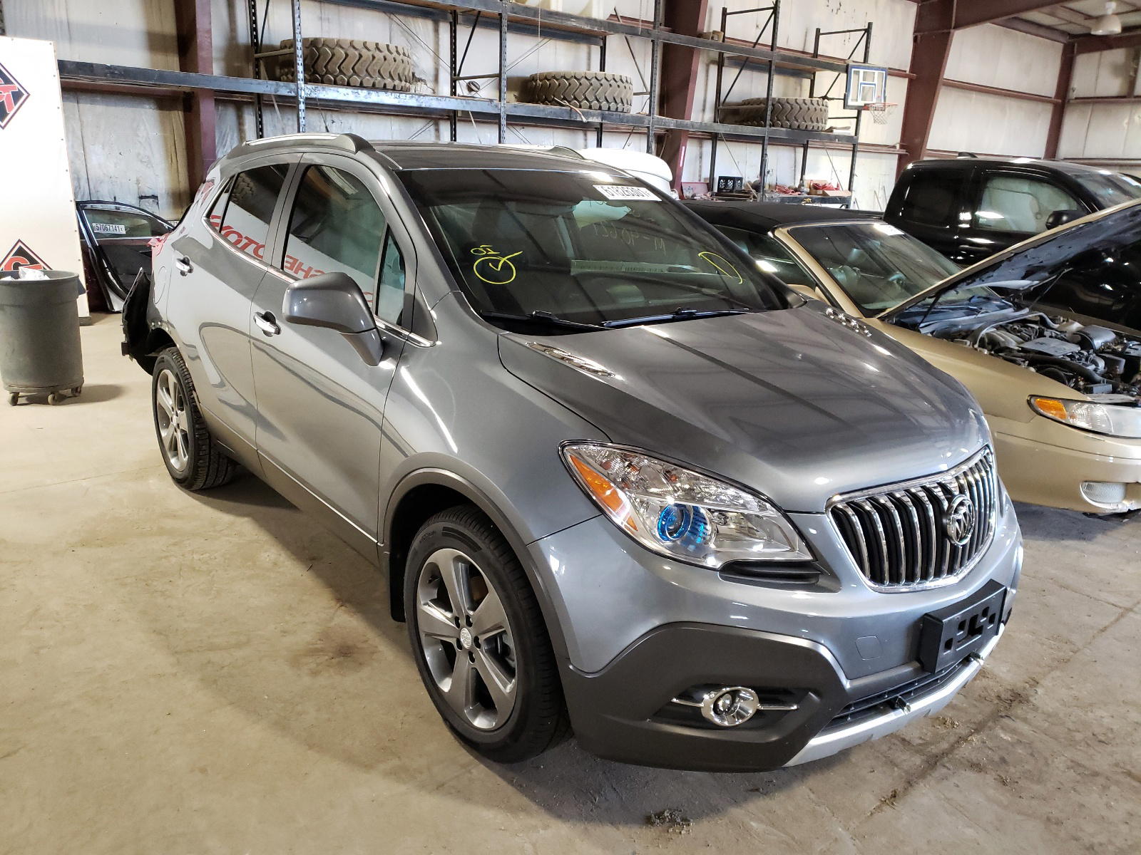BUICK ENCORE CON 2013 with VIN KL4CJBSBXDB098995 - Photo from auction