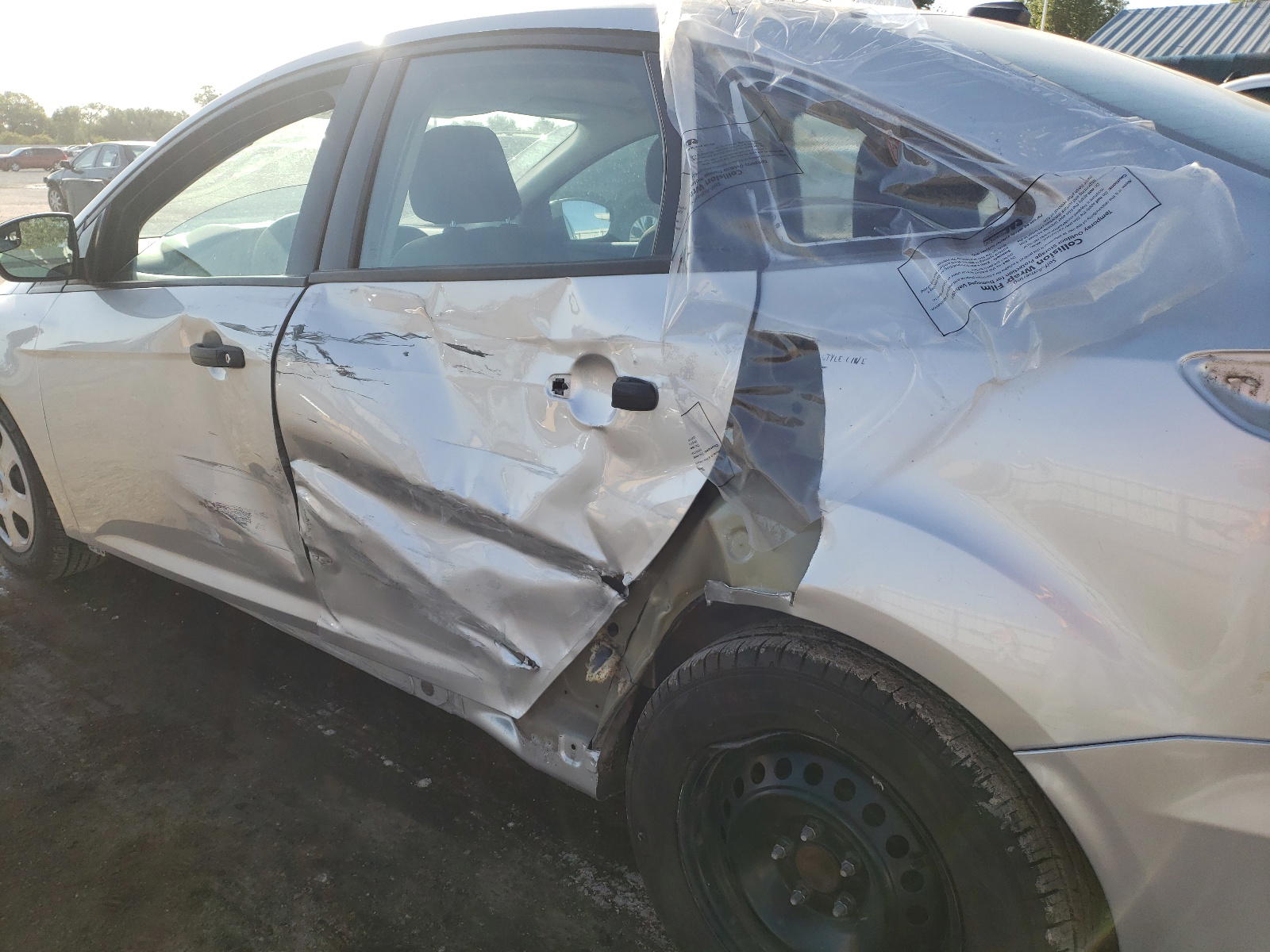 Photo 9 from auction – 2017 FORD FOCUS S with VIN 1FADP3E24HL214448