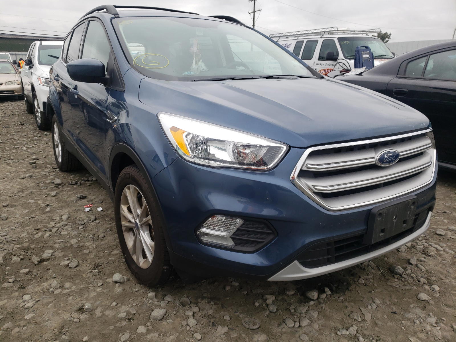 FORD ESCAPE SE 2018 with VIN 1FMCU9GD7JUC84411 - Photo from auction