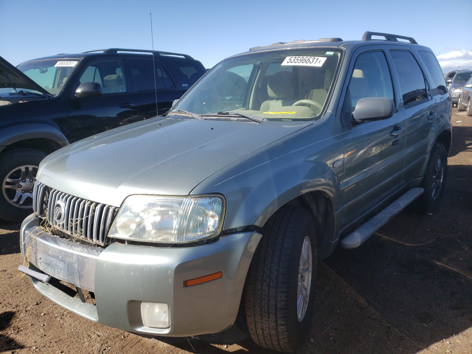 Photo 2 from auction – 2006 MERCURY MARINER with VIN 4M2YU57126DJ09378