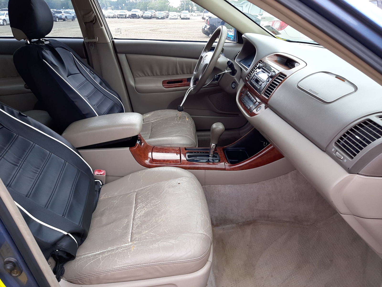 Photo 5 from auction – 2004 TOYOTA CAMRY LE with VIN 4T1BF30KX4U568146