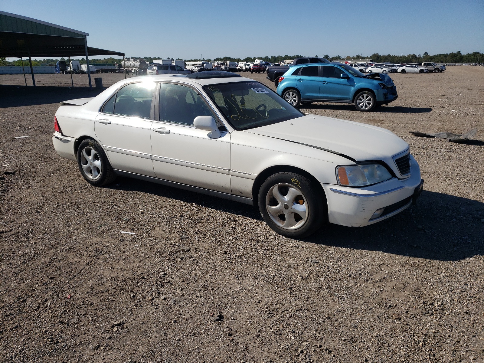 ACURA 3.5RL 1999 with VIN JH4KA9667XC007637 - Photo from auction