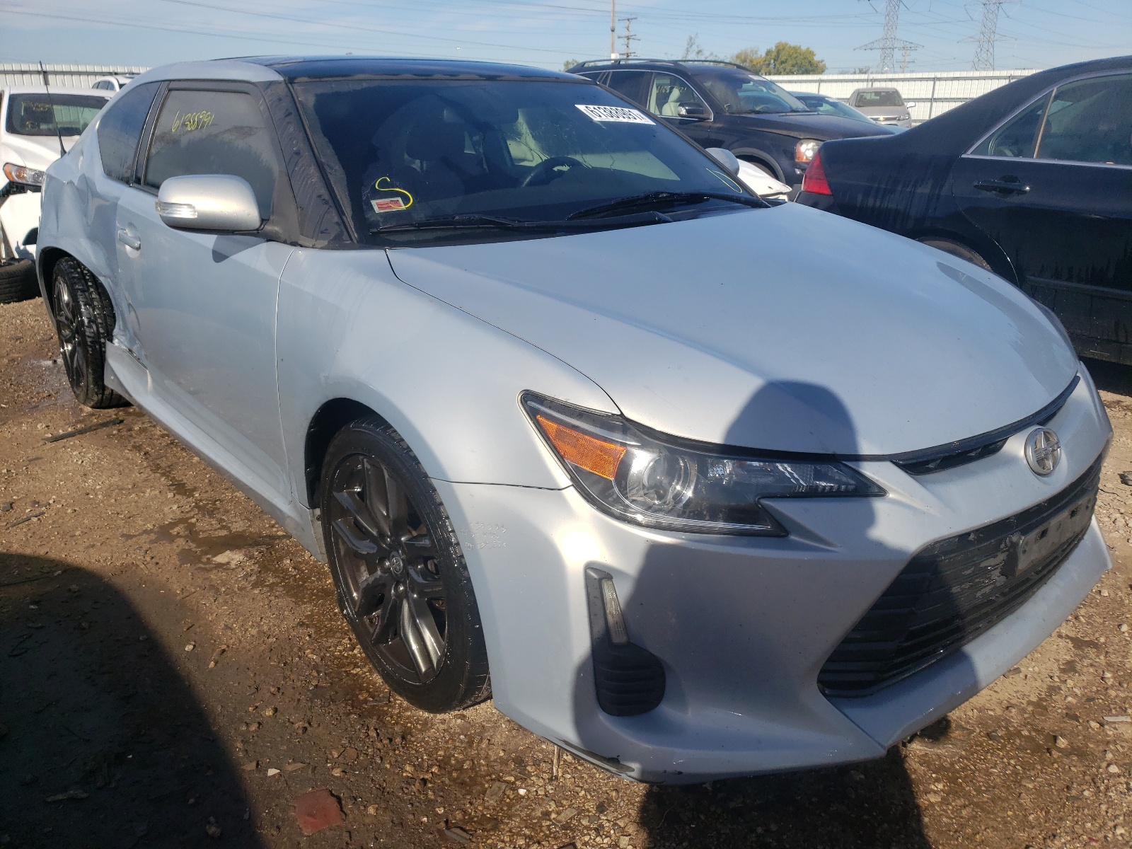 TOYOTA SCION TC 2014 with VIN JTKJF5C77E3072594 - Photo from auction