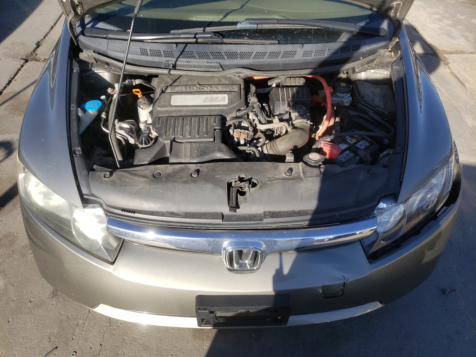 Photo 7 from auction – 2006 HONDA CIVIC HYBR with VIN JHMFA36236S011829