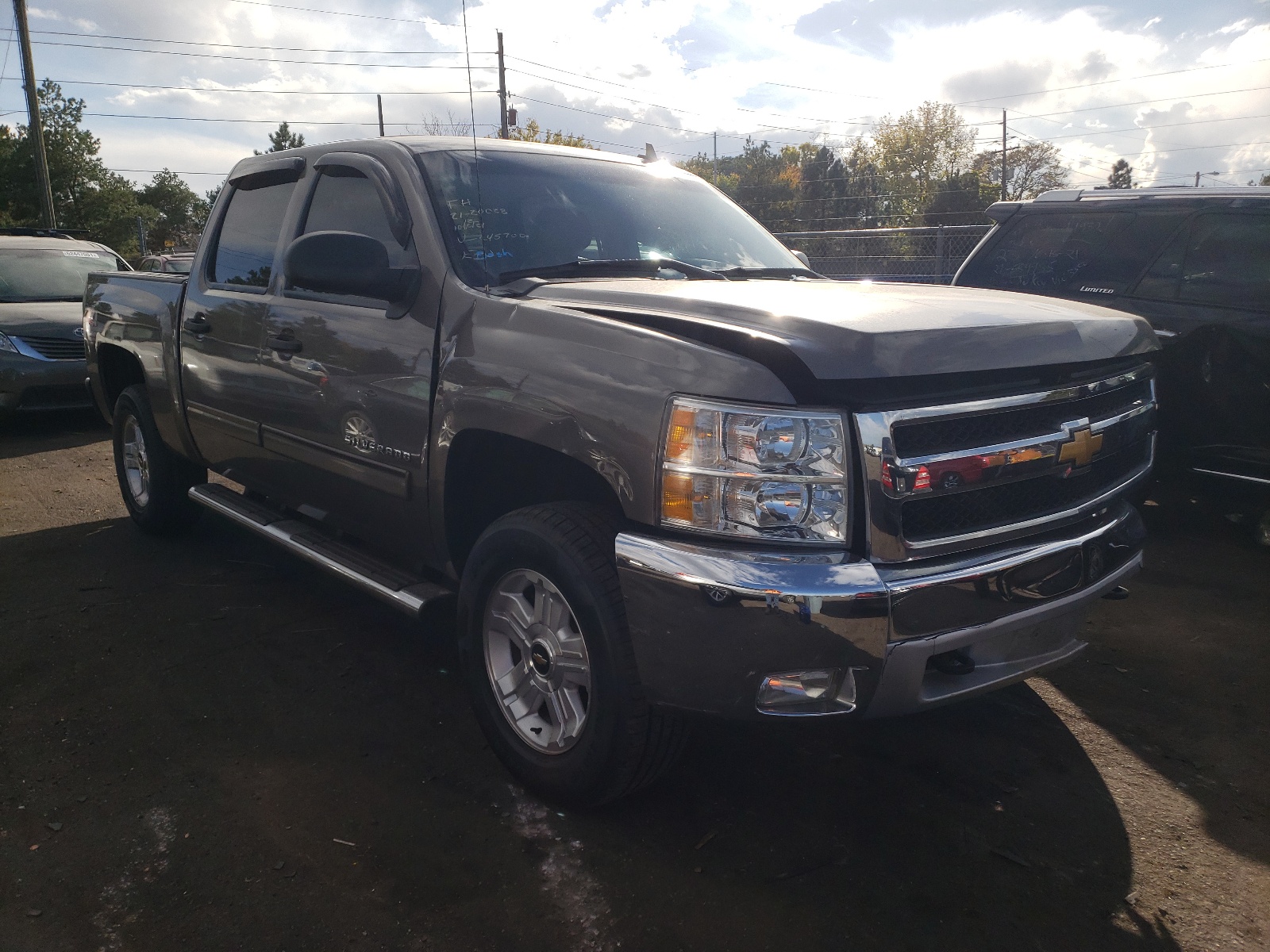 CHEVROLET SILVERADO 2013 with VIN 3GCPKSE77DG245700 - Photo from auction