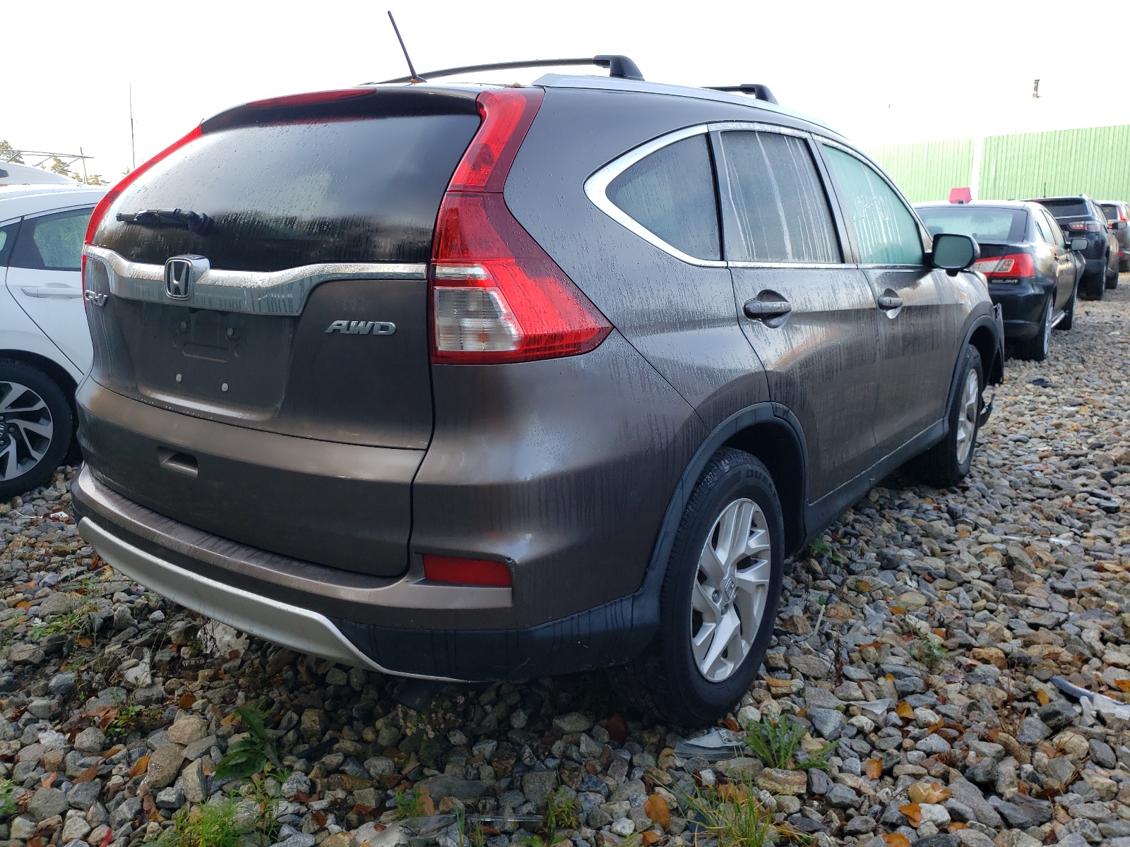 Photo 4 from auction – 2015 HONDA CR-V EX with VIN 2HKRM4H57FH696242