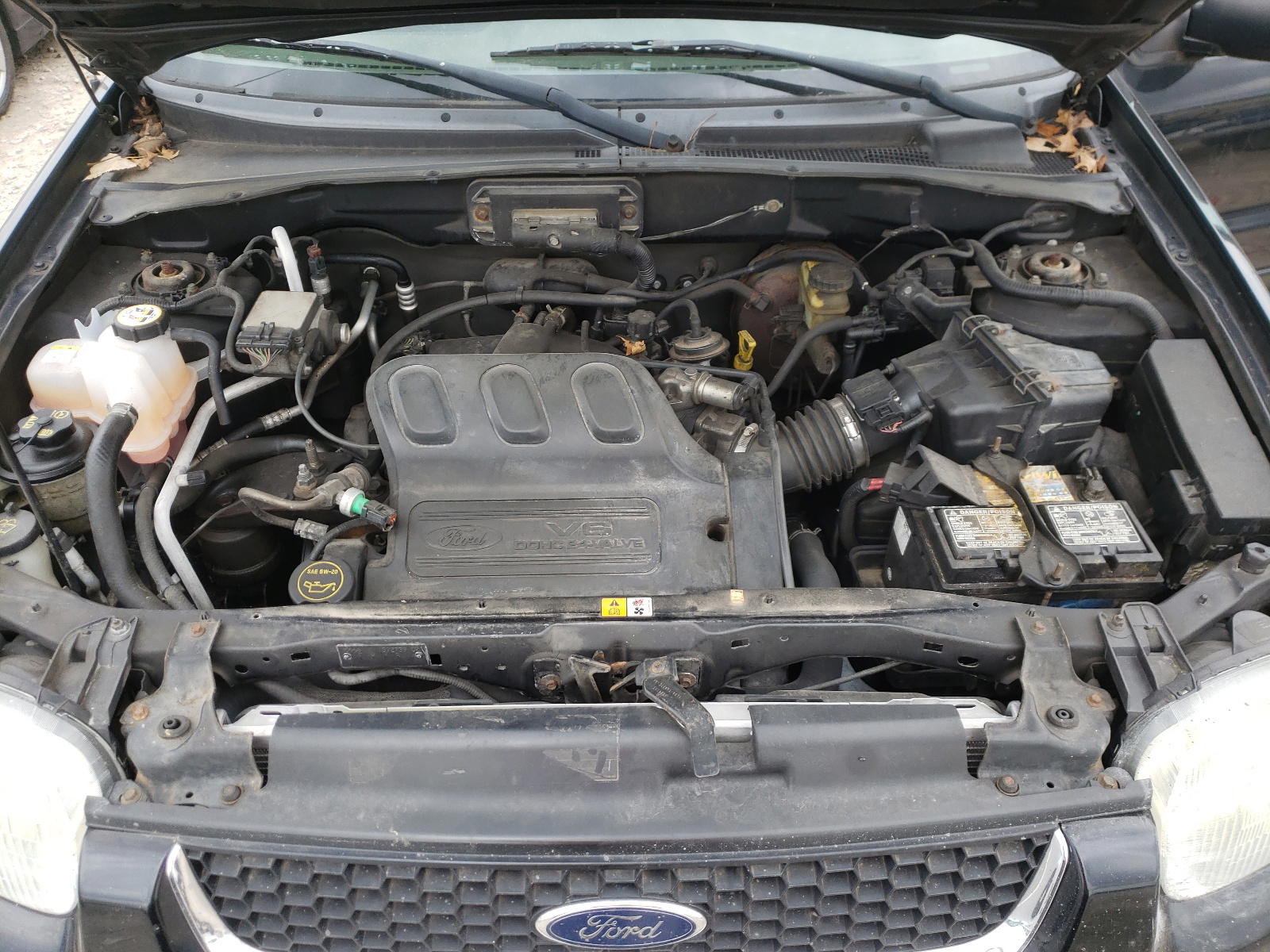 Photo 7 from auction – 2004 FORD ESCAPE LIM with VIN 1FMCU04184KA41132