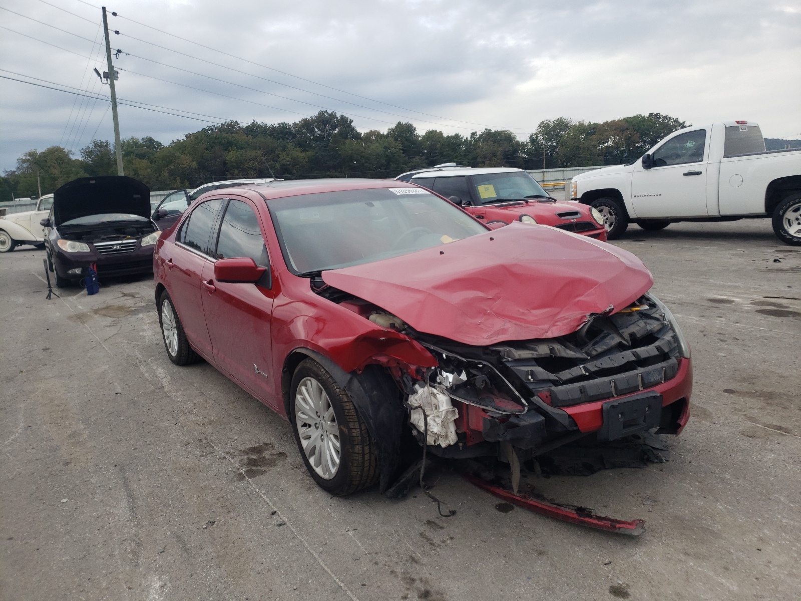 FORD FUSION HYB 2012 with VIN 3FADP0L36CR320338 - Photo from auction