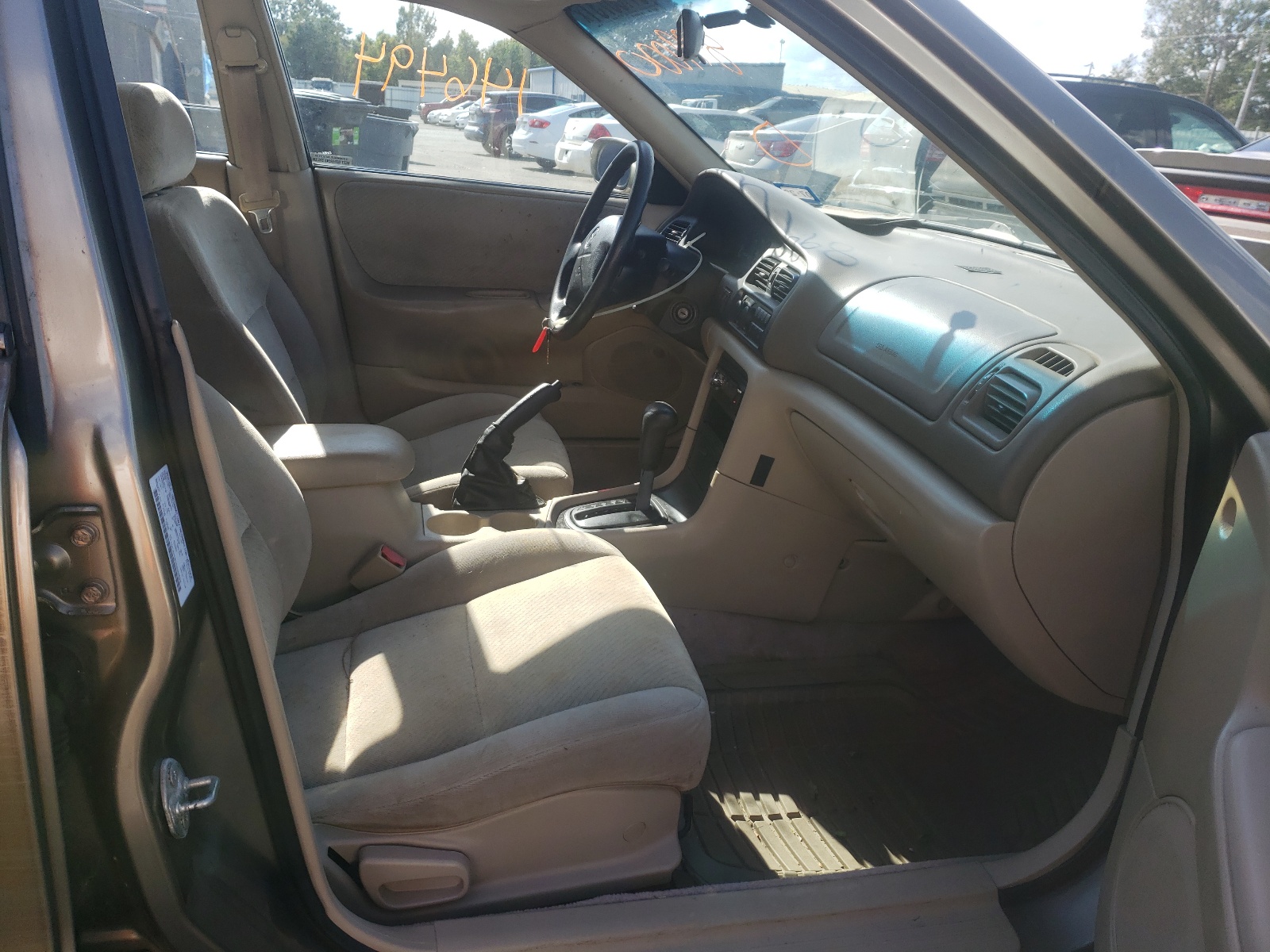 Photo 5 from auction – 1999 MAZDA 626 ES with VIN 1YVGF22C0X5899000