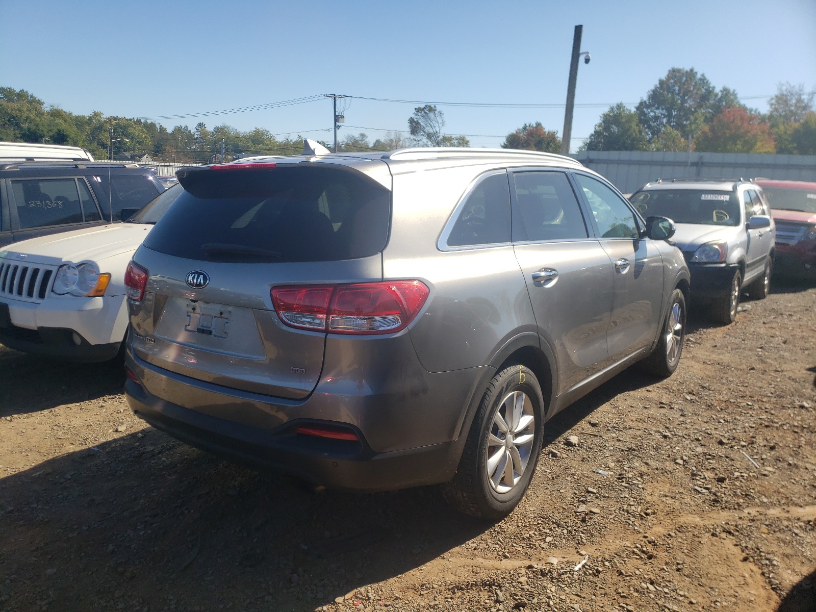 Photo 4 from auction – 2016 KIA SORENTO LX with VIN 5XYPG4A39GG117364