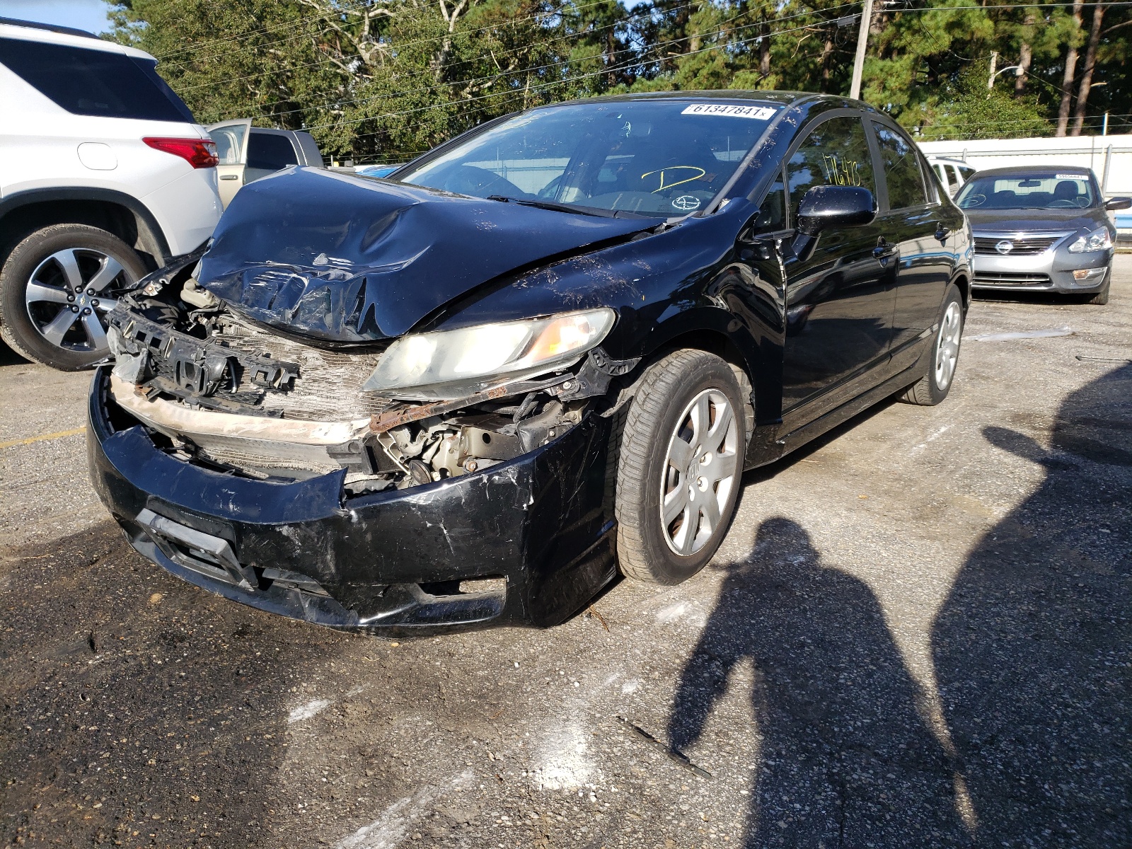 Photo 2 from auction – 2009 HONDA CIVIC LX with VIN 19XFA16579E049104
