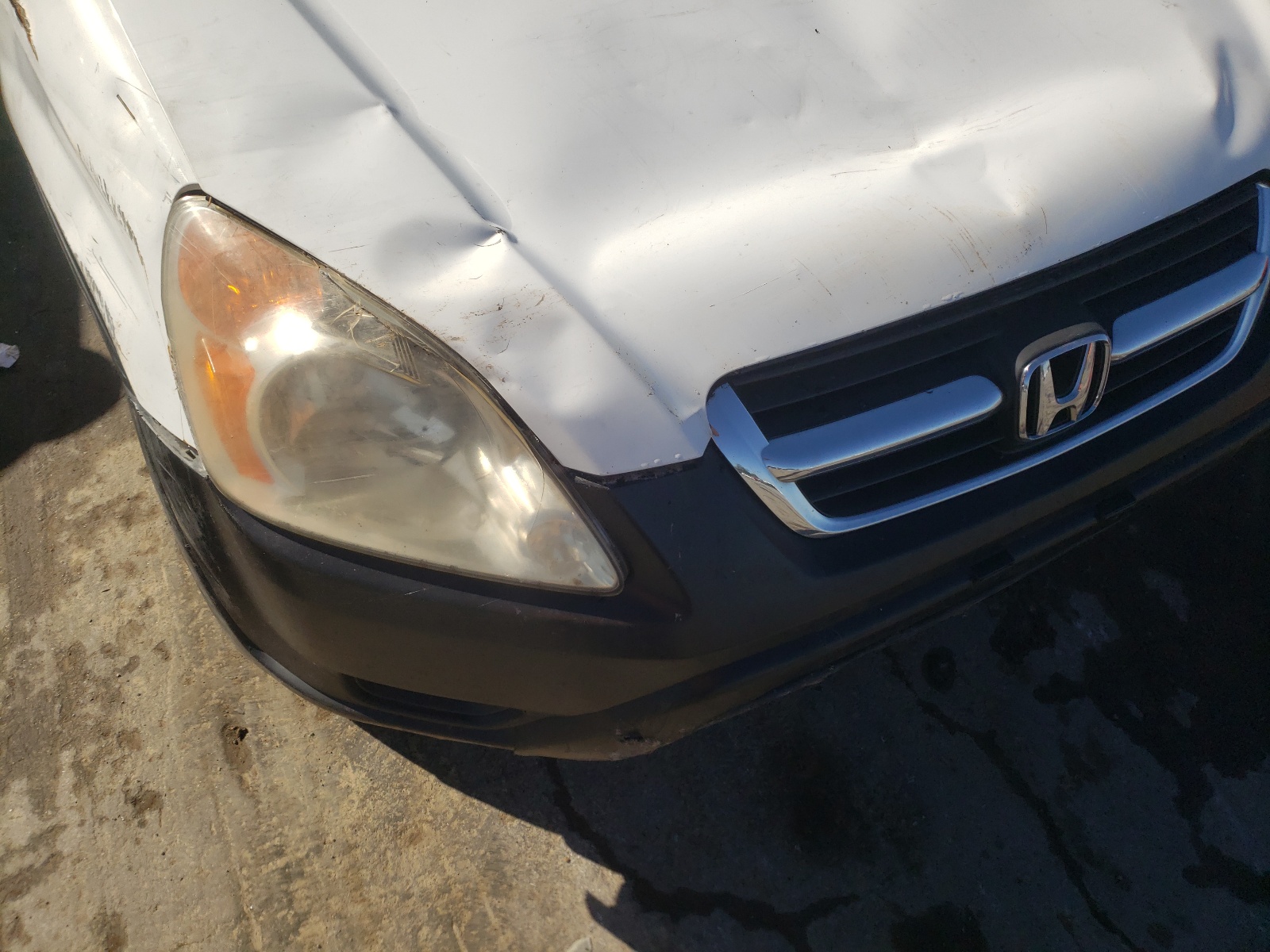 Photo 9 from auction – 2002 HONDA CR-V LX with VIN JHLRD68452C005608