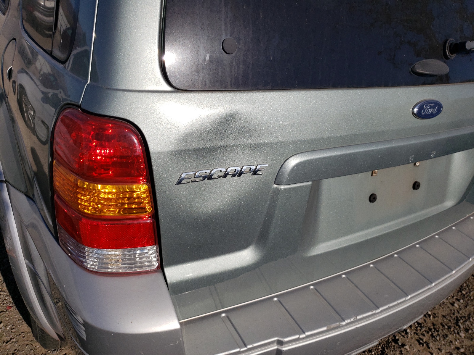 Photo 9 from auction – 2005 FORD ESCAPE HEV with VIN 1FMCU96H75KD54477