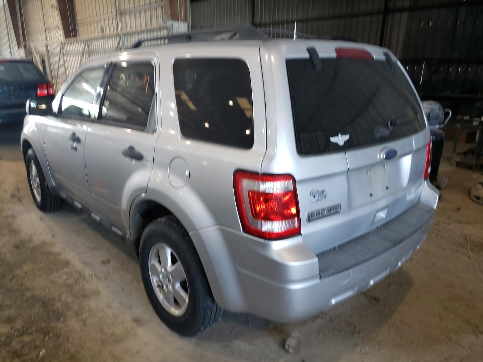 Photo 16 from auction – 2011 FORD ESCAPE XLT with VIN 1FMCU0D78BKA85942