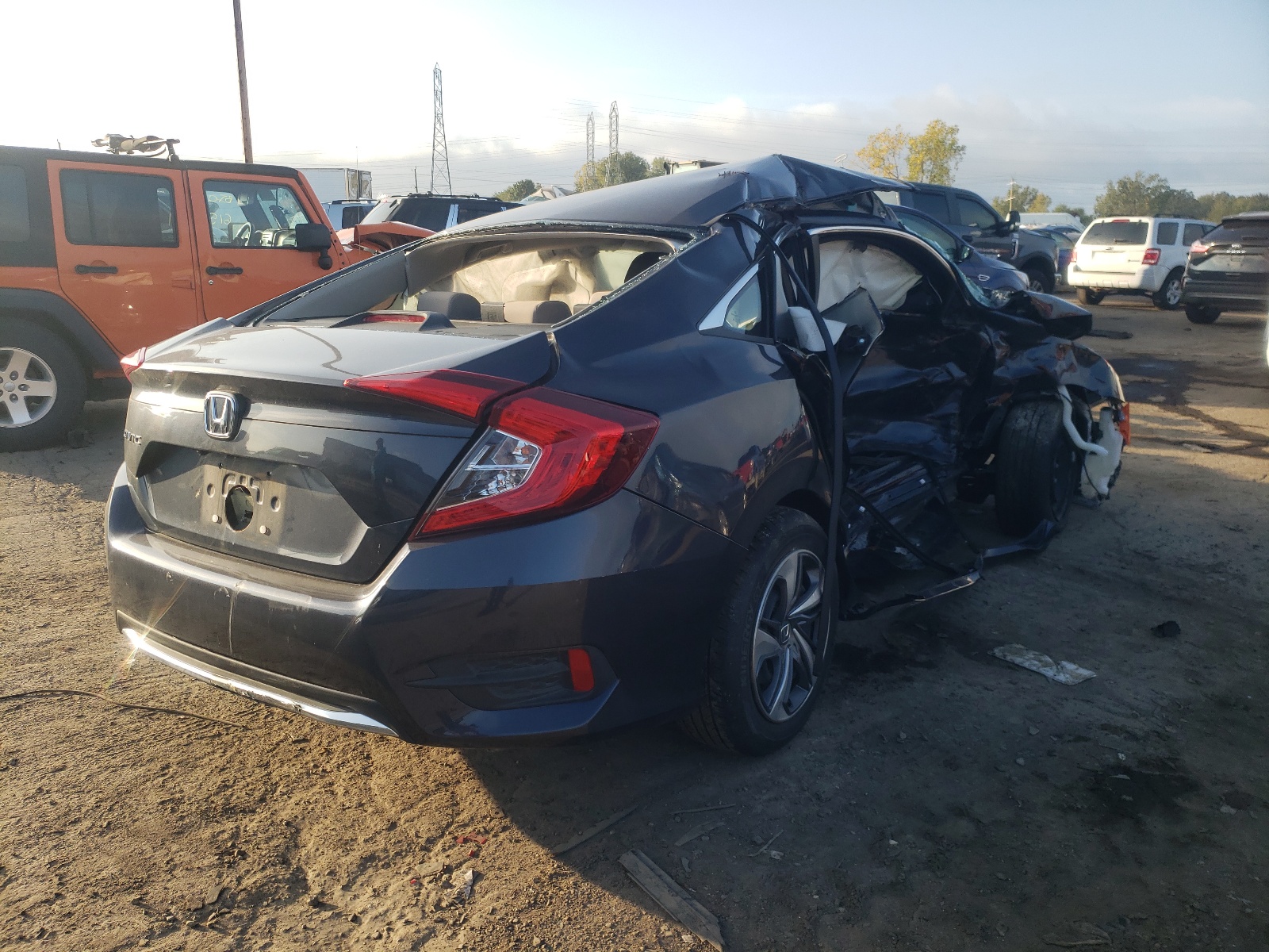 Photo 4 from auction – 2019 HONDA CIVIC LX with VIN 2HGFC2F6XKH553635
