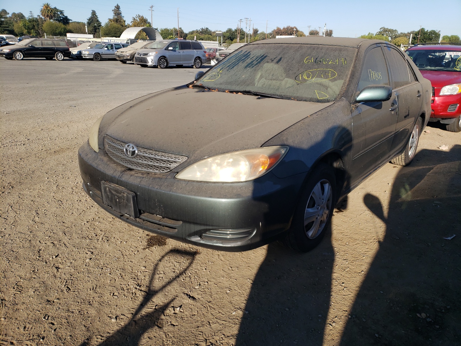 Photo 2 from auction – 2003 TOYOTA CAMRY LE with VIN JTDBE32K730168149