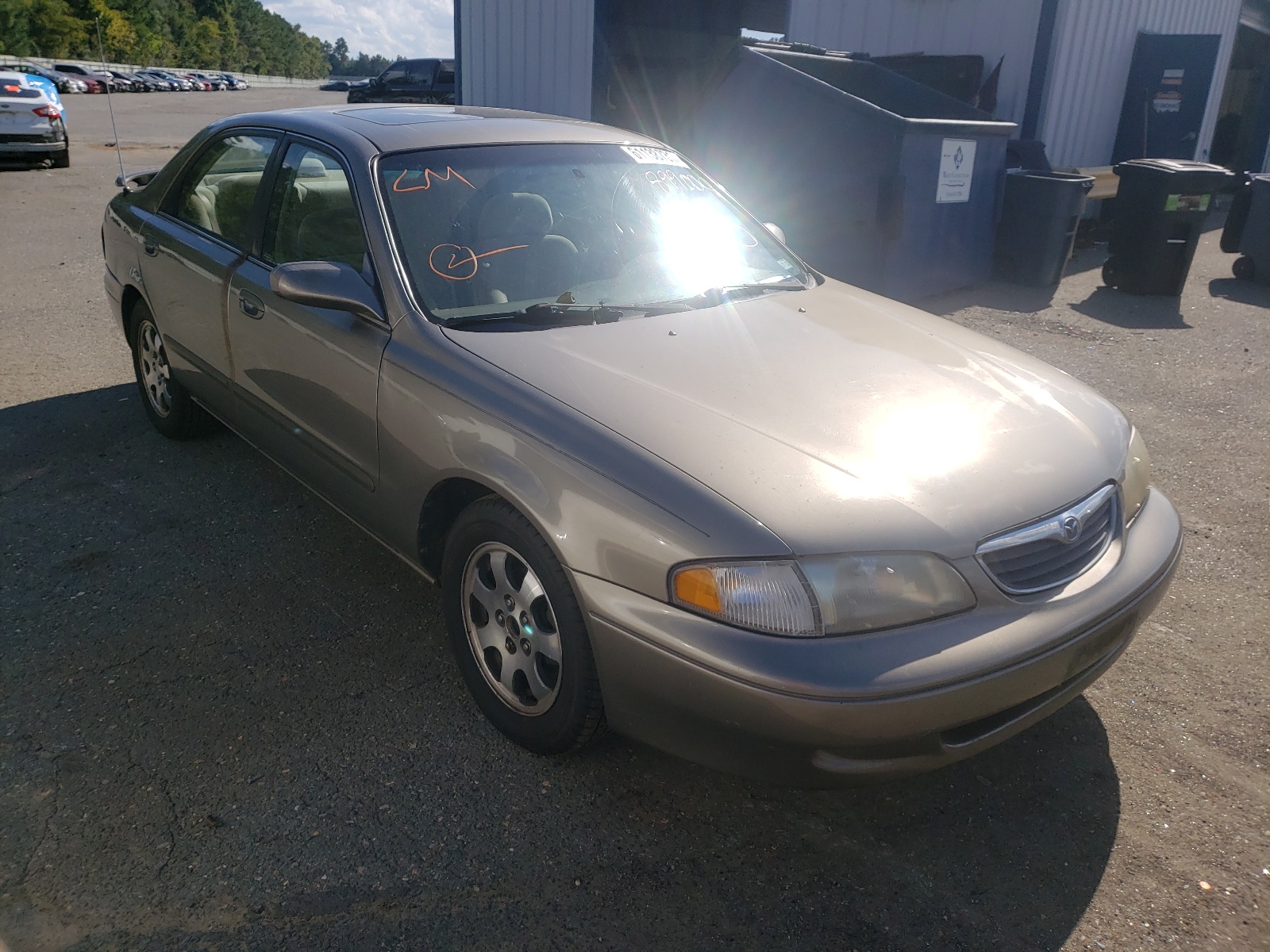 MAZDA 626 ES 1999 with VIN 1YVGF22C0X5899000 - Photo from auction
