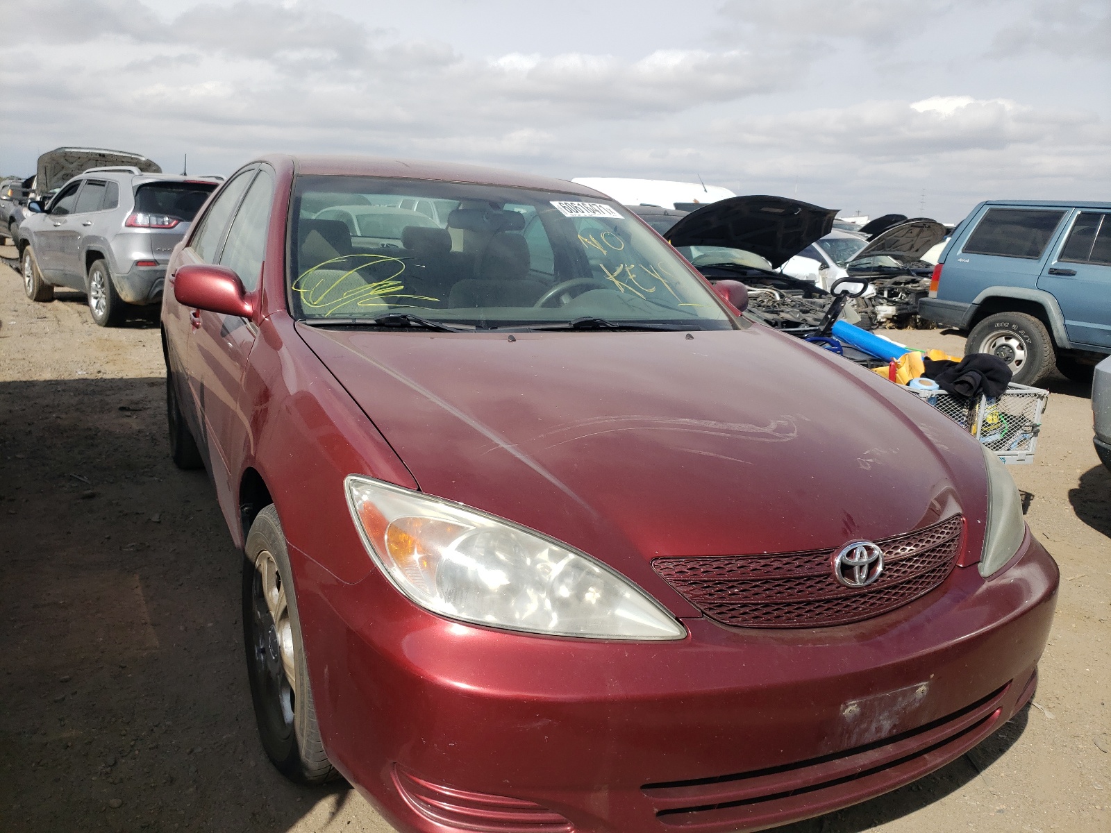 TOYOTA CAMRY LE 2002 with VIN 4T1BF30K12U035146 - Photo from auction