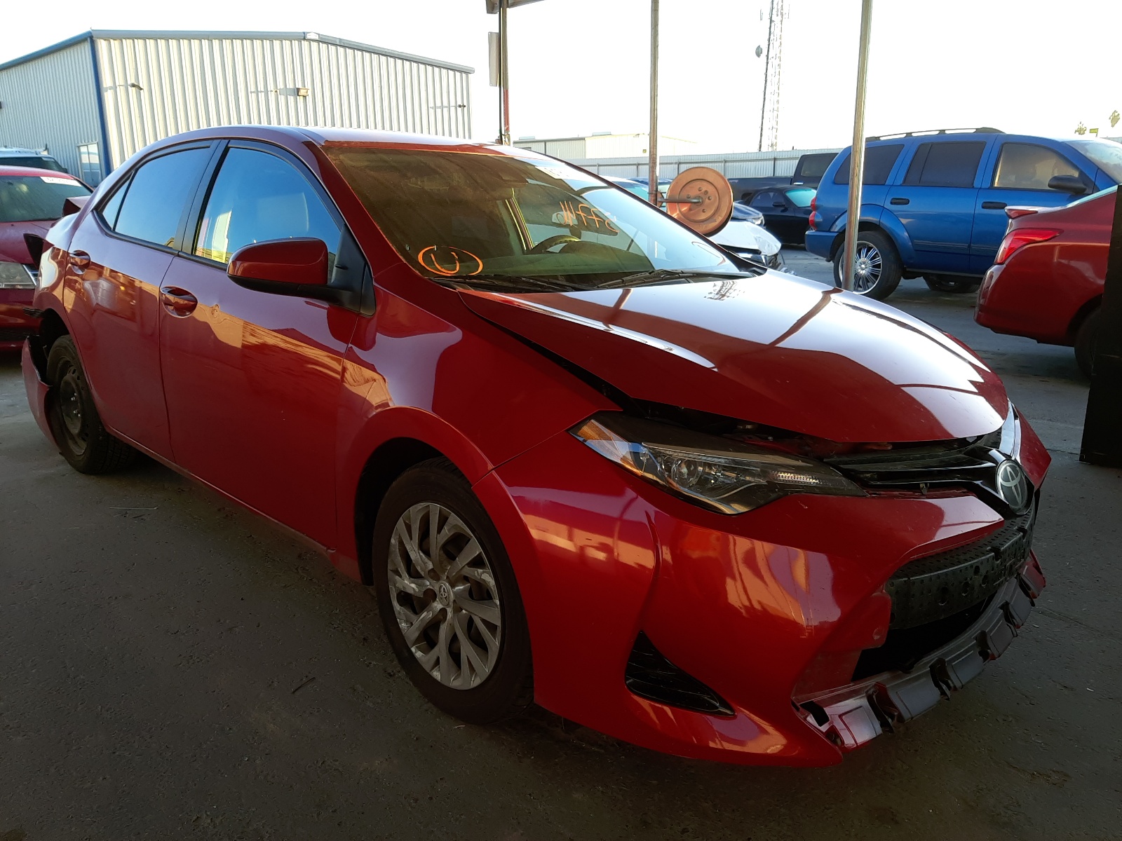 TOYOTA COROLLA L 2018 with VIN 5YFBURHE4JP843403 - Photo from auction