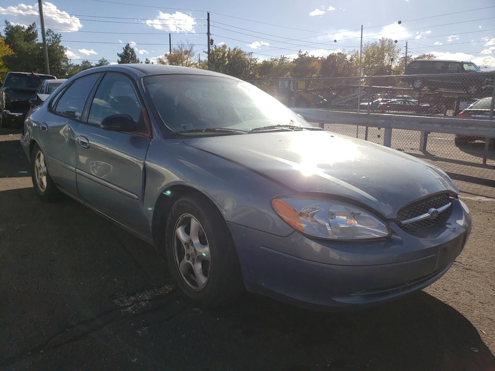 FORD TAURUS LX 2001 with VIN 1FAFP52U71G165481 - Photo from auction