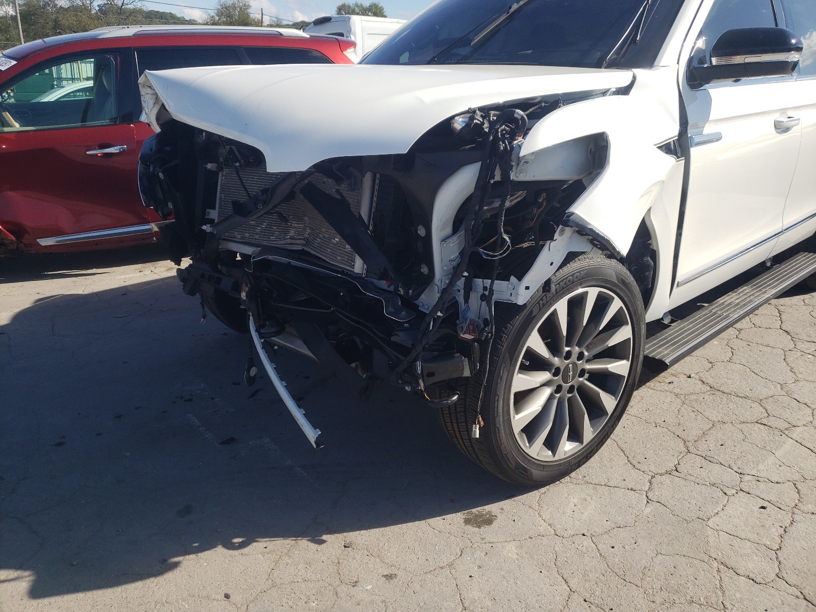 Photo 9 from auction – 2020 LINCOLN NAVIGATOR with VIN 5LMJJ2LT2LEL17958