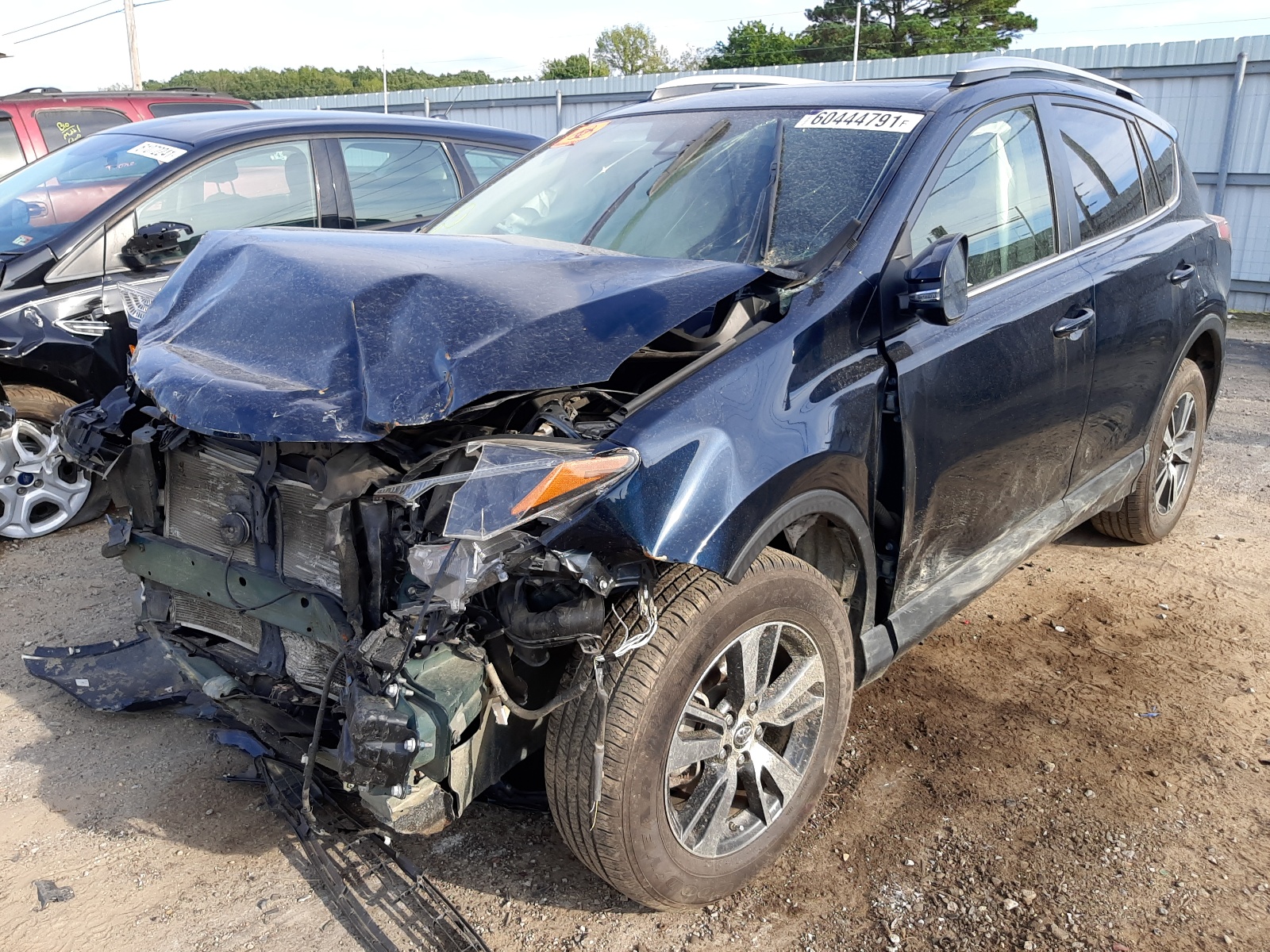 Photo 2 from auction – 2017 TOYOTA RAV4 XLE with VIN JTMRFREV3HJ716444