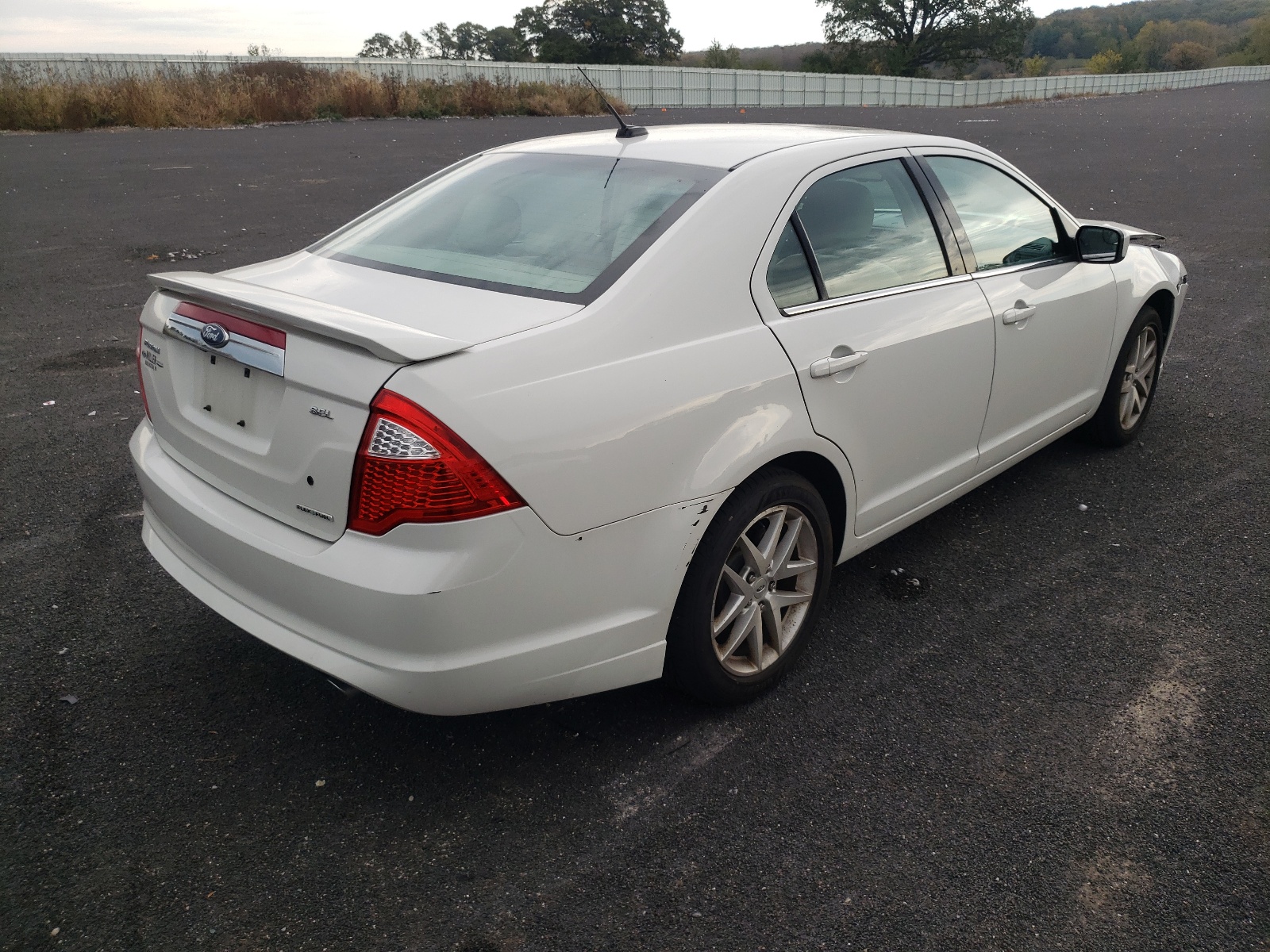 Photo 4 from auction – 2011 FORD FUSION SEL with VIN 3FAHP0JG1BR143347