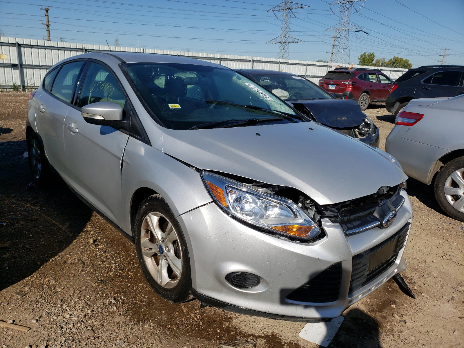 FORD FOCUS SE 2013 with VIN 1FADP3K25DL114888 - Photo from auction