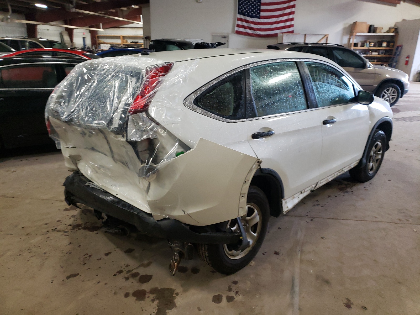 Photo 4 from auction – 2014 HONDA CR-V LX with VIN 5J6RM4H35EL007785