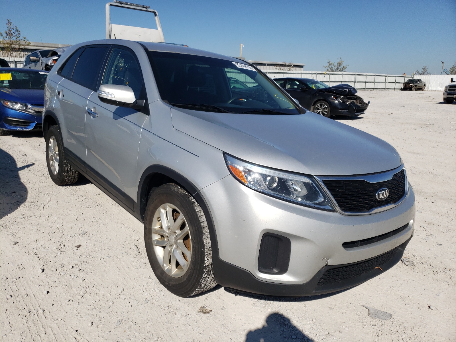 KIA SORENTO LX 2014 with VIN 5XYKT3A65EG521964 - Photo from auction