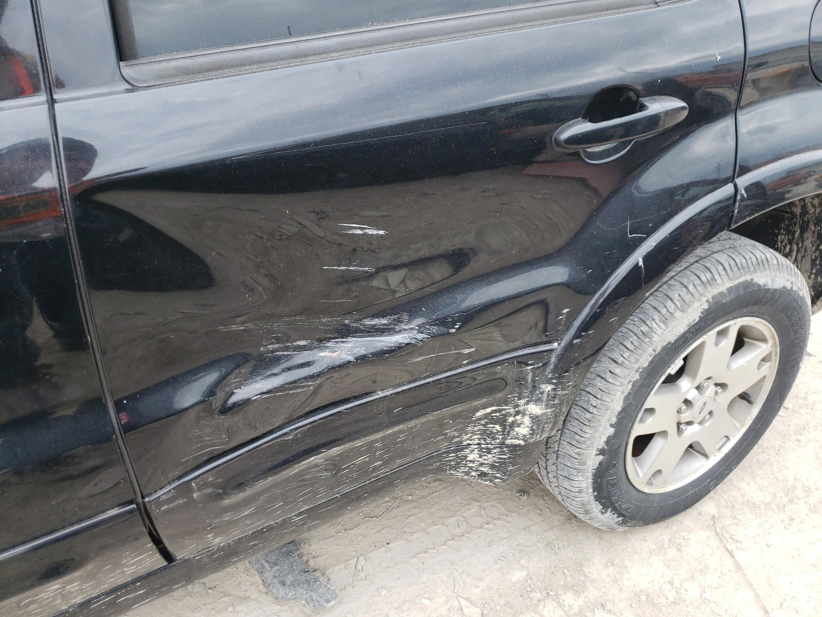 Photo 9 from auction – 2004 FORD ESCAPE LIM with VIN 1FMCU04184KA41132