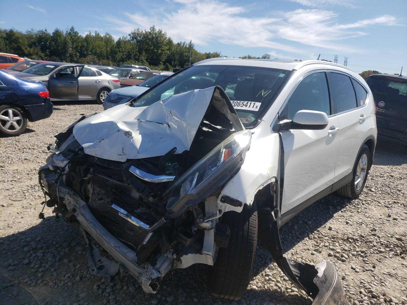 Photo 2 from auction – 2015 HONDA CR-V EXL with VIN 5J6RM4H7XFL028281
