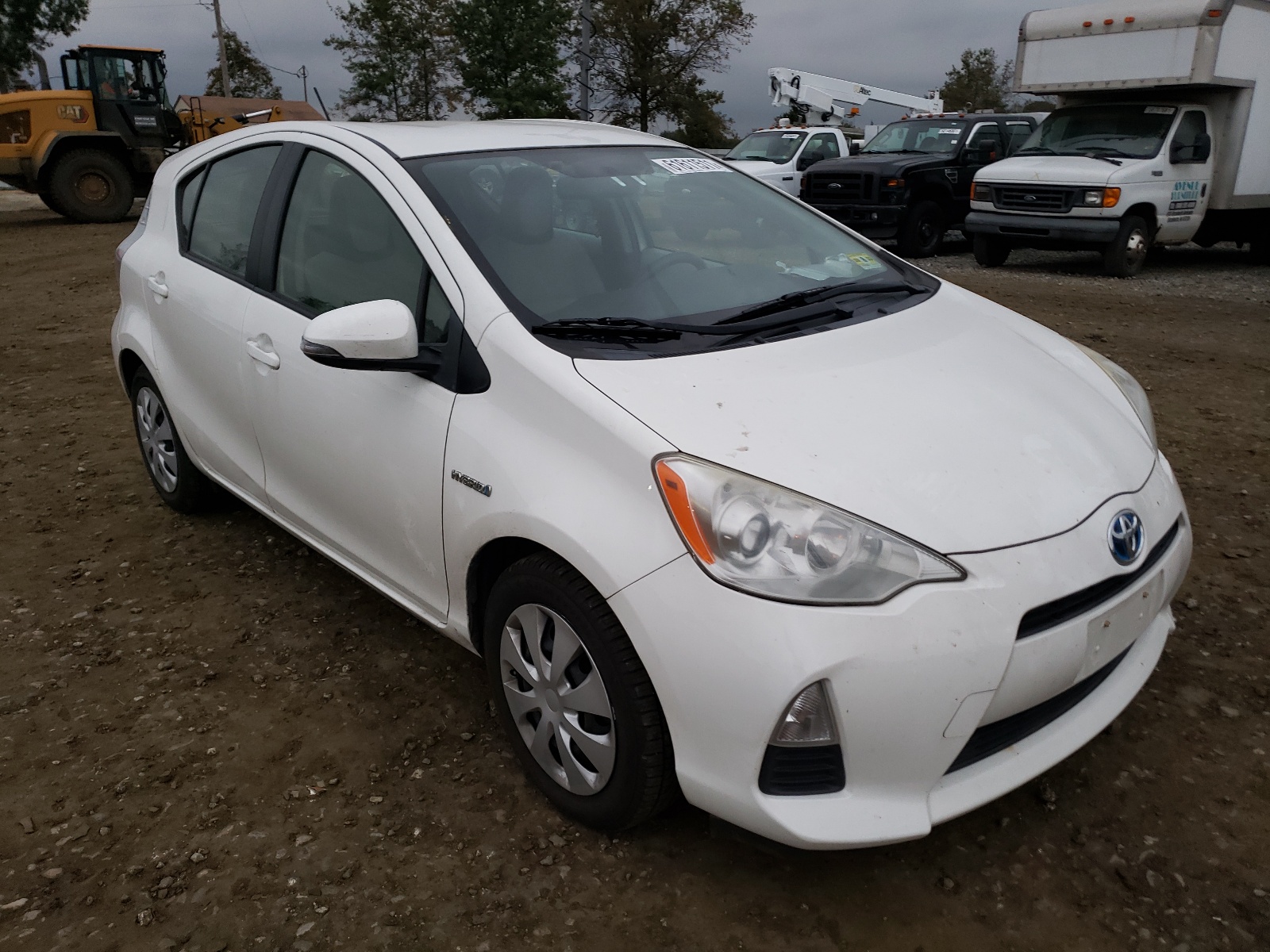 TOYOTA PRIUS C 2014 with VIN JTDKDTB38E1074466 - Photo from auction