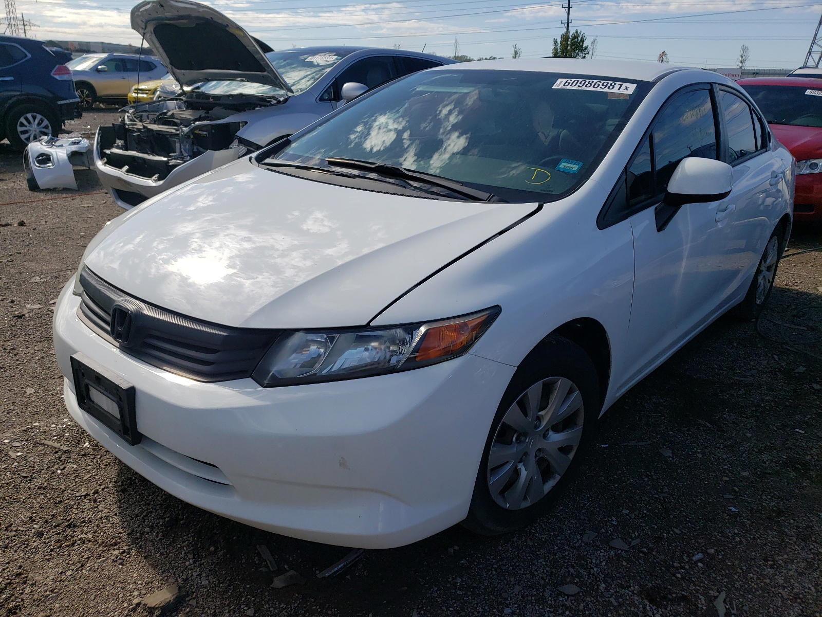 Photo 2 from auction – 2012 HONDA CIVIC LX with VIN 19XFB2F55CE052870