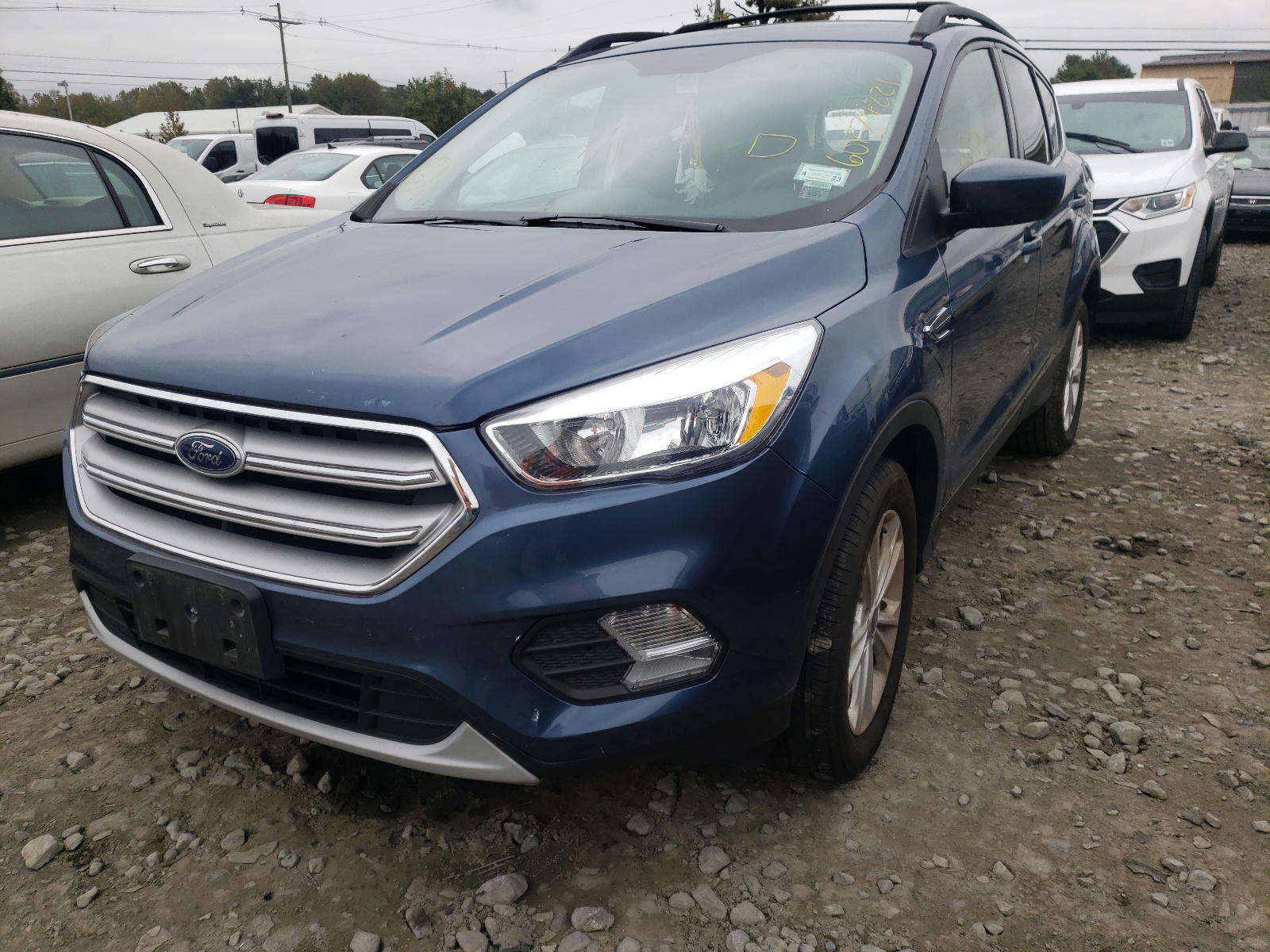 Photo 2 from auction – 2018 FORD ESCAPE SE with VIN 1FMCU9GD7JUC84411