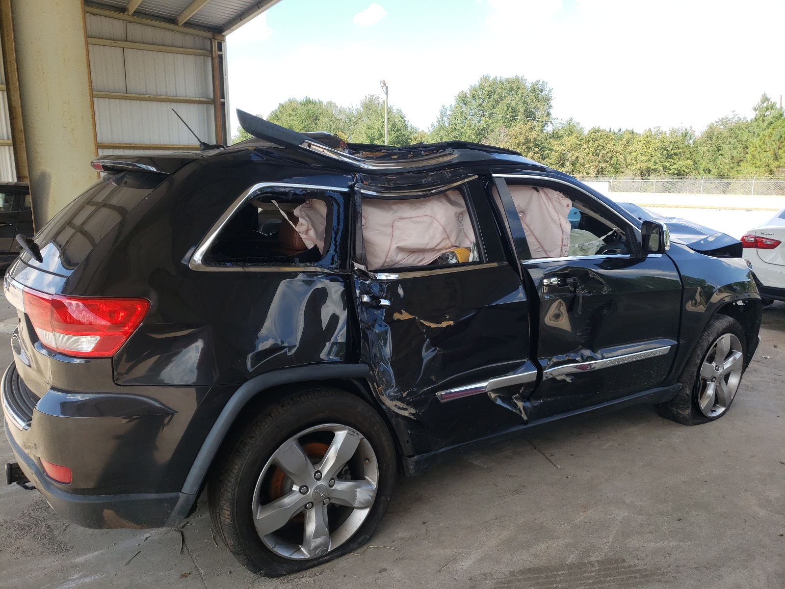 Photo 9 from auction – 2012 JEEP GRAND CHER with VIN 1C4RJECG1CC305200