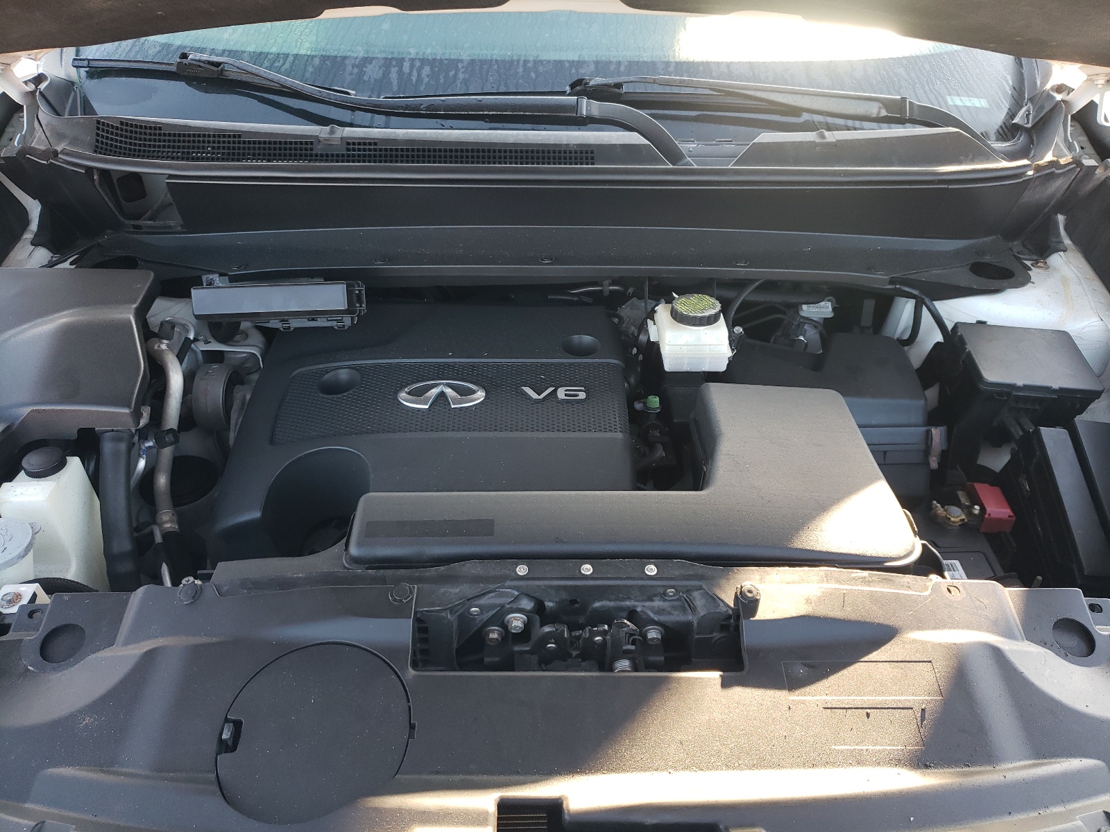 Photo 7 from auction – 2013 INFINITI JX35 with VIN 5N1AL0MM7DC304564