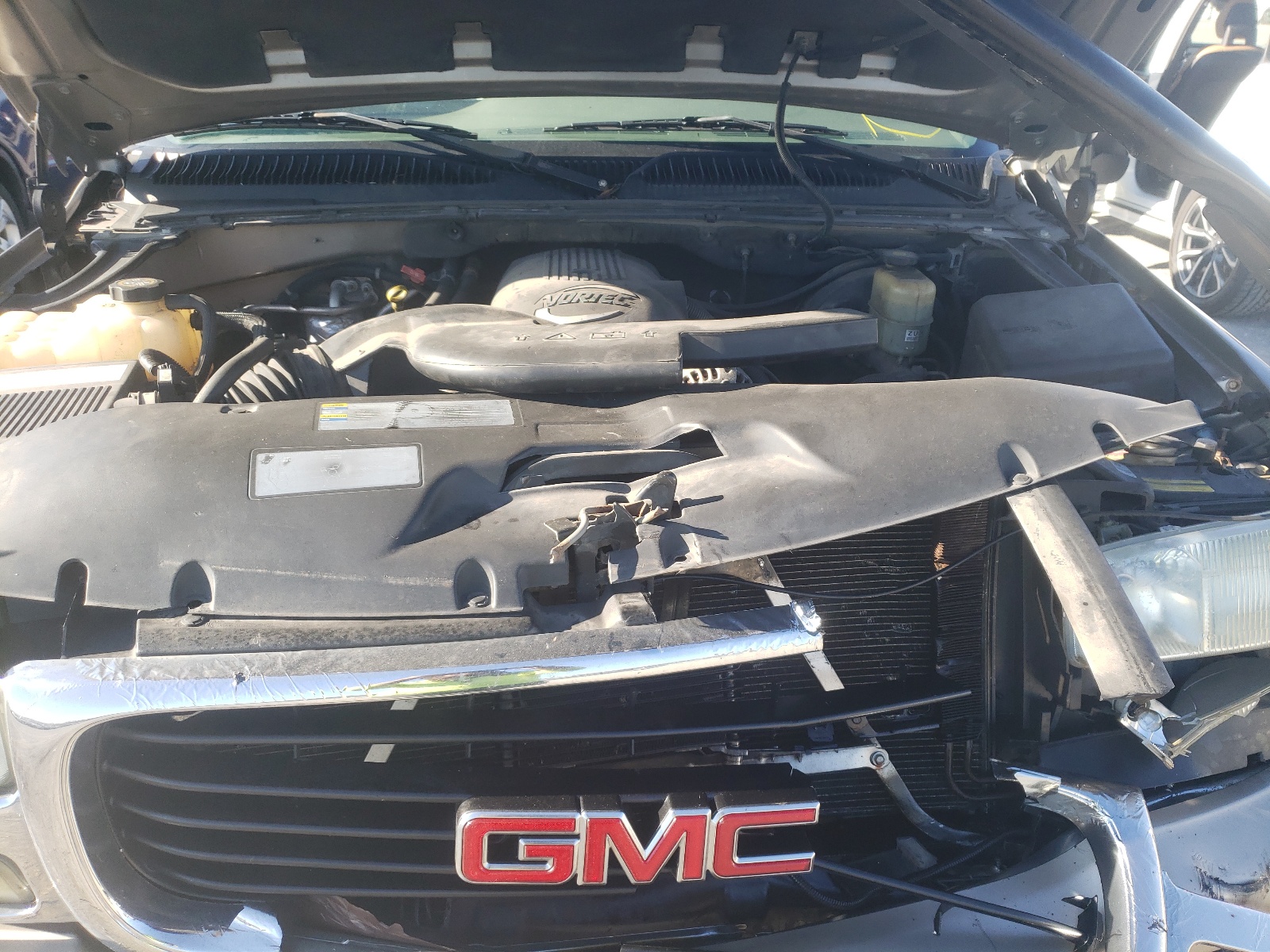 Photo 7 from auction – 2002 GMC YUKON with VIN 1GKEK13Z92J299988