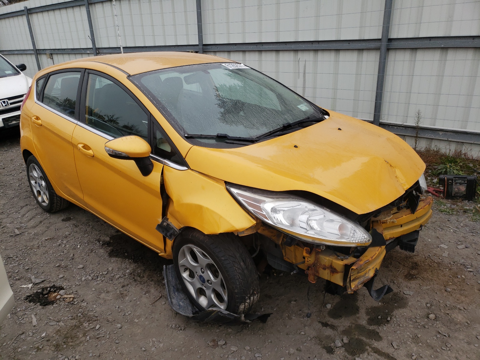 FORD FIESTA SES 2011 with VIN 3FADP4FJ2BM231492 - Photo from auction