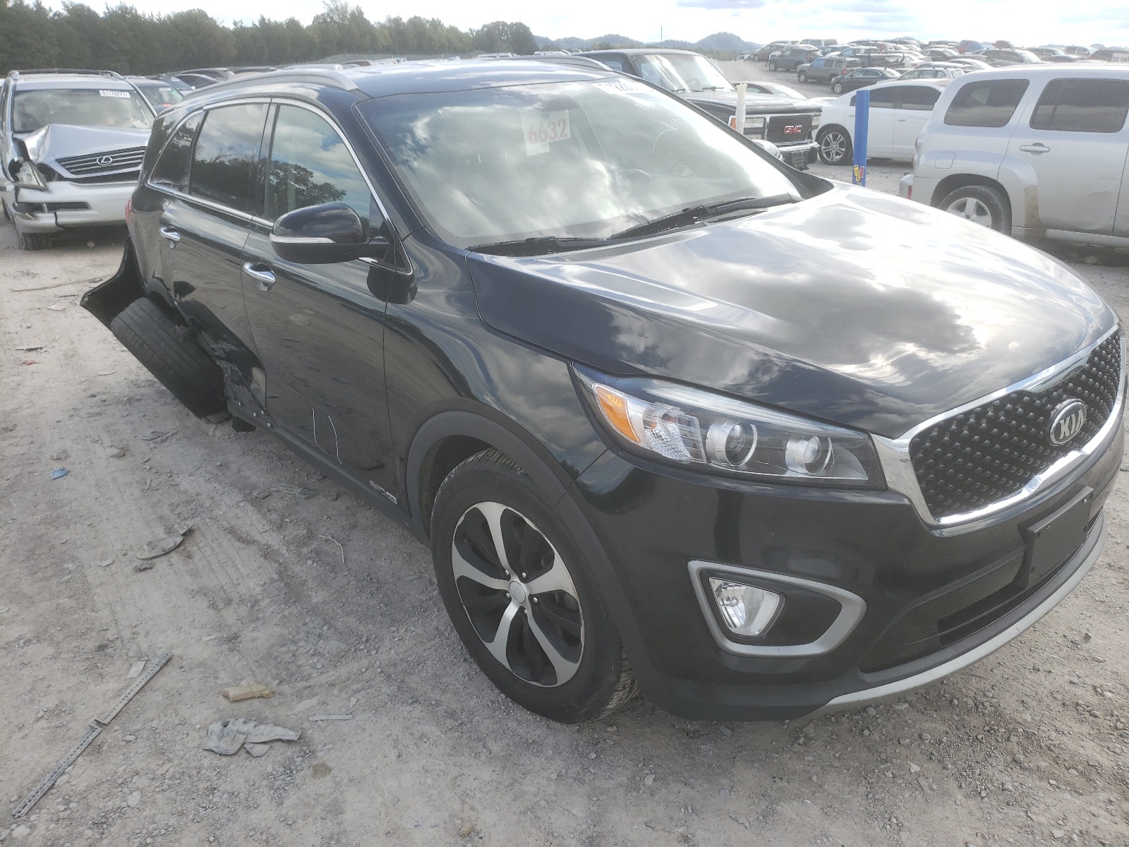 KIA SORENTO EX 2016 with VIN 5XYPHDA5XGG160450 - Photo from auction