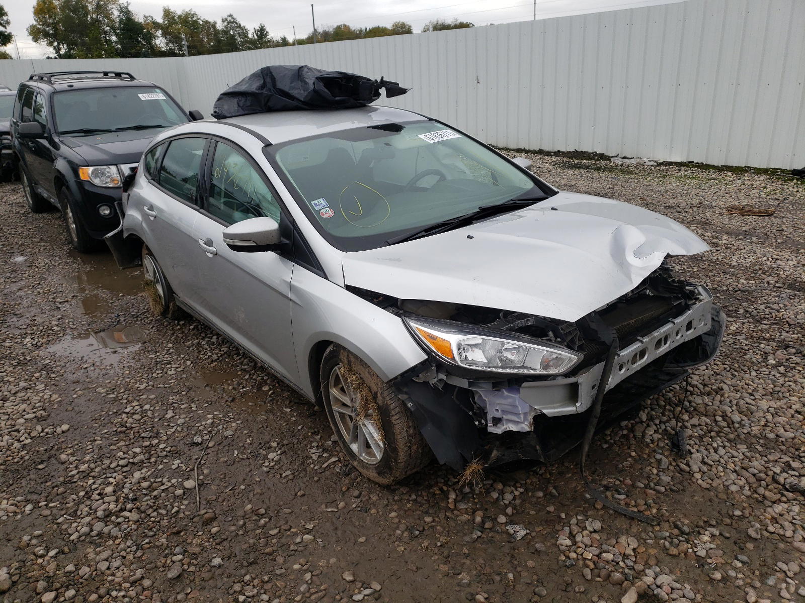 FORD FOCUS SE 2018 with VIN 1FADP3K22JL258605 - Photo from auction
