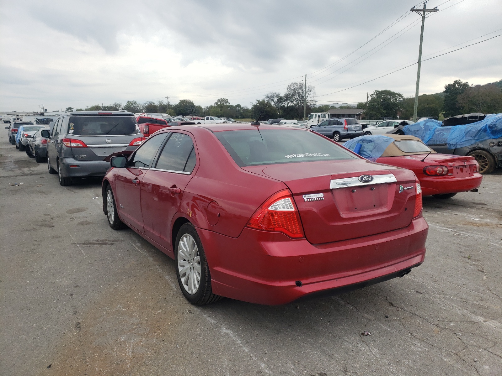 Photo 3 from auction – 2012 FORD FUSION HYB with VIN 3FADP0L36CR320338