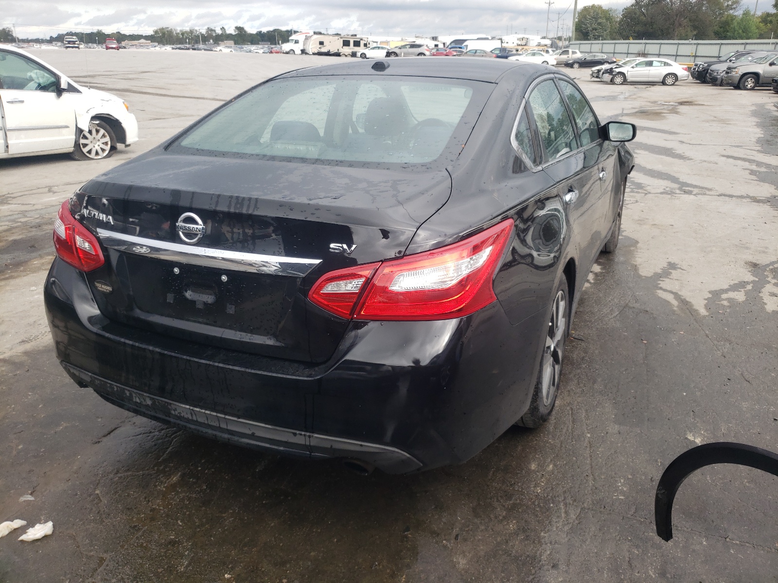 Photo 4 from auction – 2016 NISSAN ALTIMA 2.5 with VIN 1N4AL3AP9GC140474