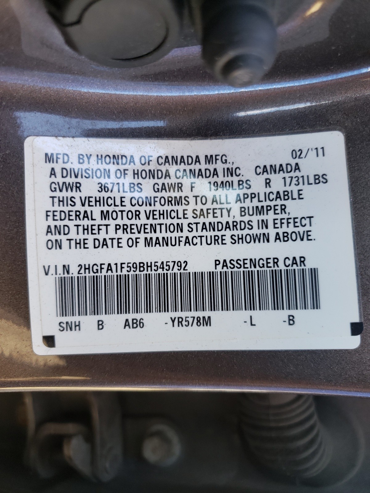 Photo 10 from auction – 2011 HONDA CIVIC LX with VIN 2HGFA1F59BH545792