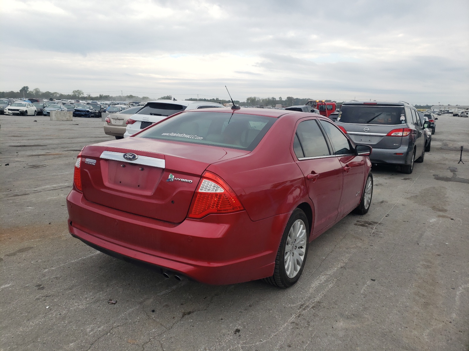 Photo 4 from auction – 2012 FORD FUSION HYB with VIN 3FADP0L36CR320338