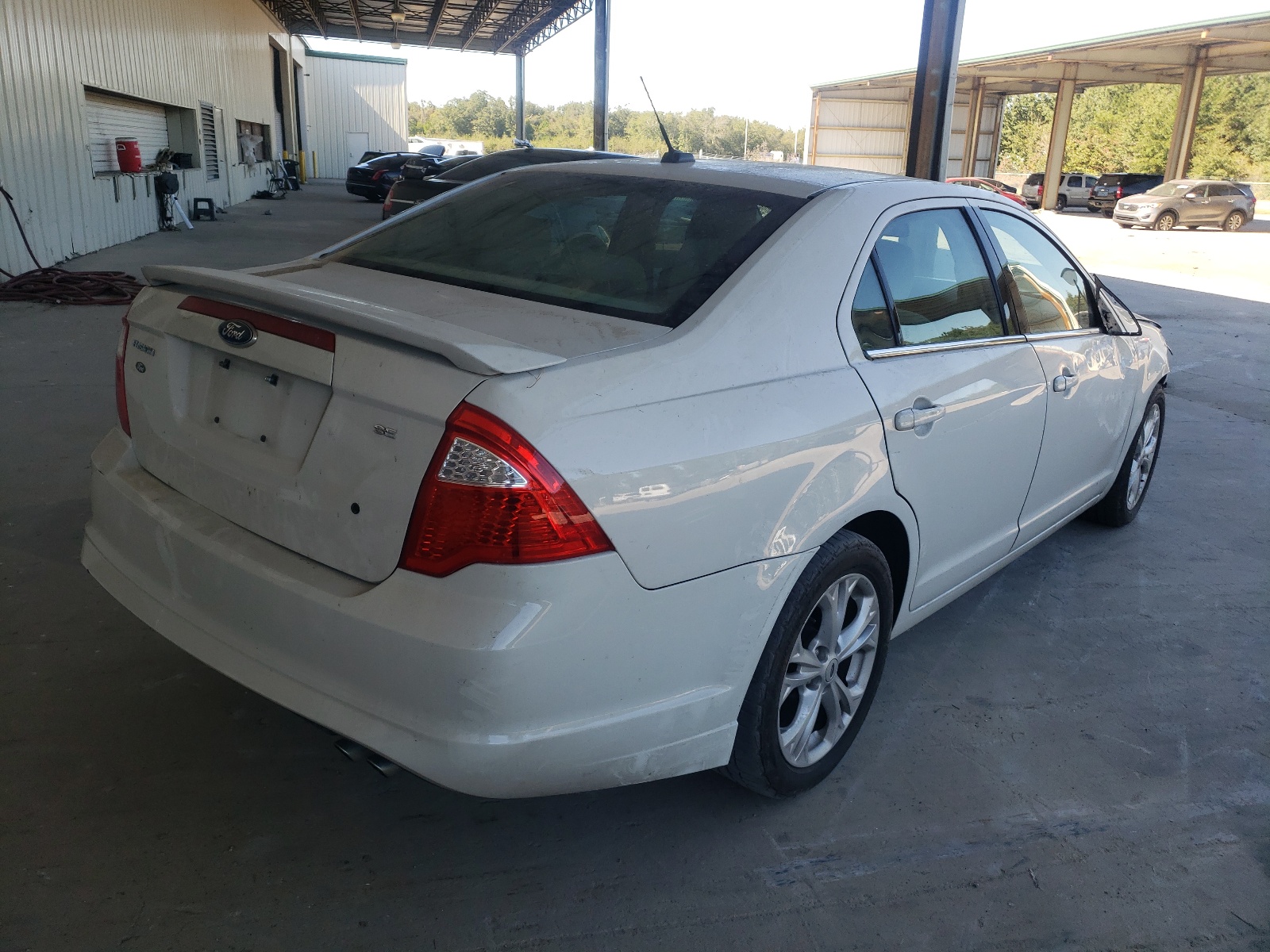 Photo 4 from auction – 2012 FORD FUSION SE with VIN 3FAHP0HA6CR103526